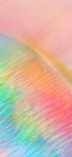 an abstract rainbow colored background with wavy lines