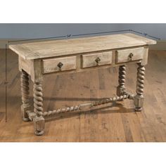 an old wooden table with two drawers on one side and roped handles on the other