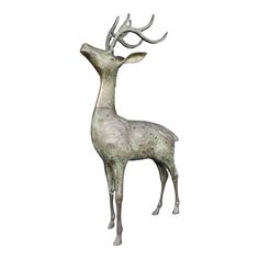 a statue of a deer with antlers on it's head is shown against a white background