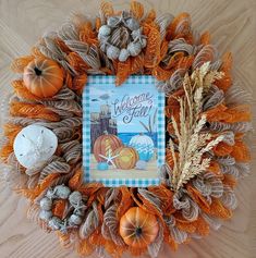 a welcome fall card surrounded by autumn decorations