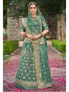 Pure Upadda Silk Mehendi Sangeet Rajputi Poshak In Green Color-81926 Product Details: Fabric: Pure Upadda silk Poshak with Contrast Humrahi Pure Odhna Work: 10 kali Multi Sequence cobinations work with resham work Hevy Odhni 4side+Jaal Desiner work with Pallu butta & gotta kiran turii Kurti with heavy baju & gala workWith work magji Color Family: Green Style:Rajasthani, Rajputana Occasion:Festive, Traditional,Wedding Washing Instruction:Dry Wash The Semi-stitched Lehenga Waist and Hips are Custo Pista Green Sharara With Pallu For Navratri, Eid Pista Green Choli With Cutdana, Green Meenakari Sharara, Green Lehenga With Resham Embroidery For Transitional Season, Transitional Green Lehenga With Resham Embroidery, Transitional Green Traditional Wear For Reception, Pista Green Lehenga With Zari Work For Transitional Season, Green Traditional Wear For Reception And Navratri, Green Traditional Wear For Reception During Navratri