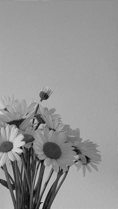 black and white photograph of flowers in a vase