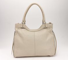 Say hello to your new constant companion. Designed in luxurious lamb leather, this bubble textured tote takes you anywhere you need to go in standout style, with plenty of pockets and interior organization to keep you feeling chic and in charge. From Vince Camuto. Clothes Videos, Interior Organization, Diy Clothes Videos, Zipper Detail, Fashion Handbags, Vince Camuto, Tote Handbags, Say Hello, Diy Clothes