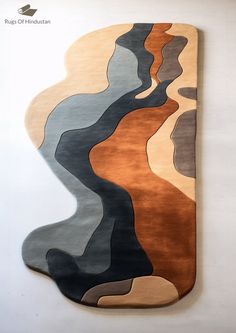 the rug is designed to look like an abstract painting