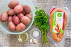 potatoes, celery, carrots and other ingredients on a table