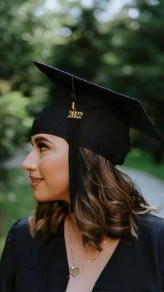 a woman wearing a graduation cap and gown