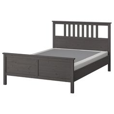 the bed frame has two drawers on each side