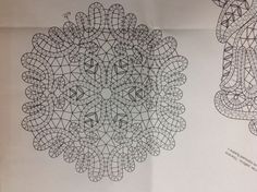 two drawings on white paper with black lines in the middle and one has an intricate design