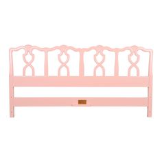 a pink headboard is shown against a white background