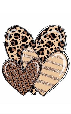 three heart shaped cookies with leopard print on the front and back, one is brown