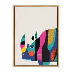 a colorful cow with horns on it's head is shown in a wooden frame