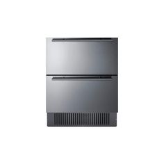 a silver refrigerator freezer sitting on top of a white wall