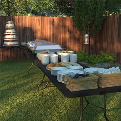 a table with food on it in the backyard