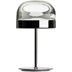 a glass table lamp with a black base and chrome plated shade on the top