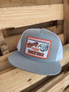 Lazy J Ranch Wear Retro Patch Cap. Heather front, white mesh back. 4 inch crown. Adjustable Snapback. Mesh Trucker Hats One Size Fits Most, Gray Summer Trucker Hat, One Size Fits Most, Gray Summer Trucker Hat One Size, Gray Trucker Hat For Summer, Gray Mesh Trucker Hat, White Mesh Back Hat With Curved Brim, White Curved Brim Hat With Mesh Back, White Trucker Hat With Mesh Back And Curved Bill, White Trucker Hat With Curved Brim And Mesh Back