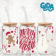 three christmas mason jars with straw tops and lids