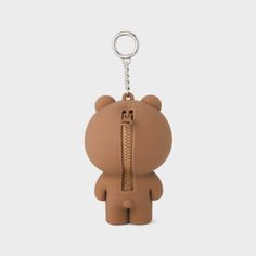 a brown bear shaped keychain with a zipper on it's front end