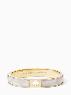 we say stack your bracelets to make a statement. this makes the first one in your pile. or the 100th. | Kate Spade Hole Punch Spade 10Mm Spade Hinge Bangle, Cream Multi White Kate Spade Jewelry, Silver Kate Spade Bangle Bracelet, Kate Spade White Round Jewelry, Kate Spade Bangle Jewelry Gift, Kate Spade Bangle Bracelets For Wedding, Kate Spade Bangle Jewelry For Gift, Kate Spade Bangle Bracelet For Weddings, Kate Spade Bangle Bracelet As Gift, Kate Spade Bangle Bracelet As A Gift