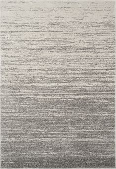 a gray and white rug with horizontal stripes