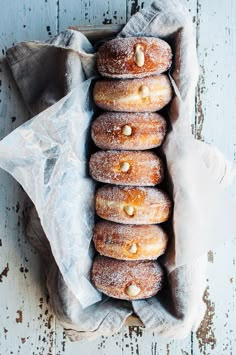 a bunch of doughnuts that are sitting in a bag