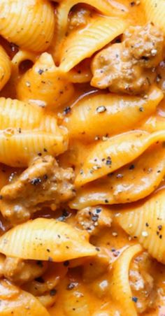 pasta with meat and sauce in a white bowl