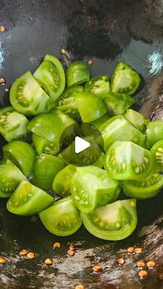 green peppers are in a frying pan with some seasonings on the side,