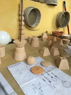 several wooden objects sitting on top of a table