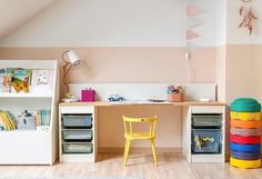 a child's desk and chair in a room