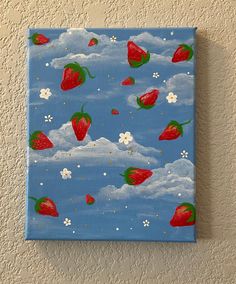 a painting of strawberries and daisies on a blue background