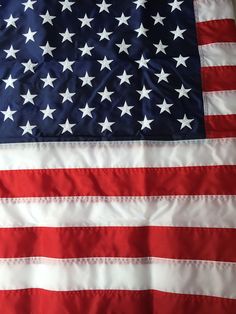 an american flag with white stars on it