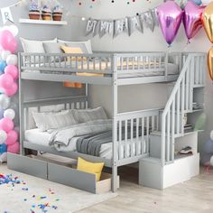 there is a bunk bed in the room with balloons