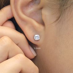 Metal: 925 Sterling Silver Stone: Cushion Cut Carat Weight (Per Stud) 5mm: 0.75 ct 6mm: 1.25 ct 7mm: 2 ct 8mm: 3 ct Setting: Four-Prong Closure: Push Back Minimalist Wedding Earrings, Cushion Cut Earrings, Cushion Cut Moissanite, Type Style, Luxury Earrings, Solitaire Studs, Moissanite Earrings, Diamond Simulant, Earring Studs