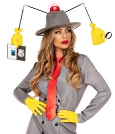 a woman in a gray suit and red tie with yellow gloves on her head is wearing a grey hat