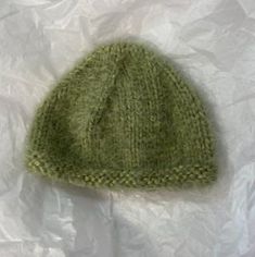 Soft yarn hand knitted to keep your baby warm during these old months. Sized for baby's 3 to 6 months old. Green Baby, Baby Warmer, 6 Months, Skull Cap Beanie, Soft Yarn, Skull Cap, Baby Hats, Baby Knitting, Caps Hats