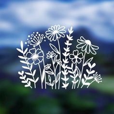 the flowers are drawn in white on a clear glass window with blue sky and clouds behind them