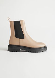 Leather chelsea boots featuring a chunky lug sole, elasticated side panels and a leather pull tab.Platform height: 3.5cm / 1.4" Square Toe Leather Boots, Mode Ab 50, Pointed Ankle Boots, Leather Snow Boots, Buckle Loafers, Colorful Shoes