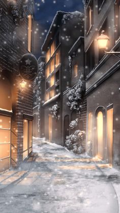 a snowy city street at night with snow falling on the ground and buildings lit up