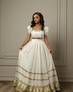 Step into a world of enchantment with our stunning collection of Habesha dresses, meticulously crafted to embody the essence of Ethiopian tradition and modern flair. Our Habesha Kemis, also known as Ethiopian dresses, captivate with their intricate designs, vibrant hues, and a touch of sparkle that exudes timeless elegance. Each garment reflects the rich cultural heritage of Ethiopia while embracing contemporary trends, making them the perfect choice for special occasions or everyday luxury. Two Piece Habesha Kemis, Habesha Dress Design, Ethiopia Clothing, Habesha Kemis Modern, Modern Habesha Dress, Ethiopian Traditional Clothes, Ethiopian Dresses, Brazilian Dress, Ethiopian Fashion