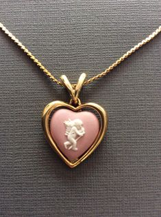 For sale I have a pretty vintage Pink Wedgwood, Jasperwear heart Cherub pendant necklace.