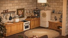 a kitchen with an oven, refrigerator and other items on the counter top in front of a brick wall