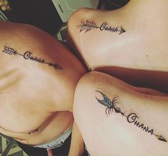 three women with matching tattoos on their stomachs