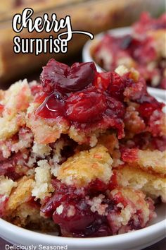 a close up of a plate of food with cranberry sauce on it and the words cherry surprise in the background