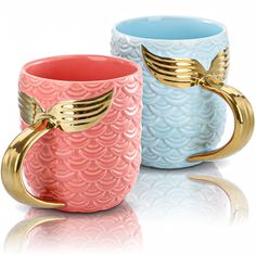 PRICES MAY VARY. YOUEON 2 pack mermaid coffee mugs comes in blue and pink color; measures 3.3 (D) x 4 (H) with a capacity of 15 oz. Stylish in look and practical for use. Our mermaid mug is made of high quality ceramic, lead-free, sturdy and durable. Hand wash is recommended. No Dishwasher and microwave safe. Cute ceramic coffee mug with mermaid shape and vivid color is an ideal mug gift for kids, girls, women, couples on birthday, Thanksgiving, Christmas, Valentine, teacher's day, mother's day Fancy Tea Cups, Mermaid Cup, Ceramic Mug Set, Cute Tea Cups, Mermaid Mugs, Cappuccino Mugs, Gift Mugs, Cute Coffee Mugs, Mugs For Men