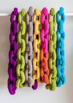 multicolored crocheted chain hanging on the wall