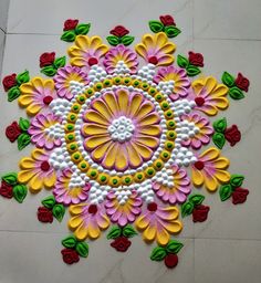 a colorful flower design is on the floor