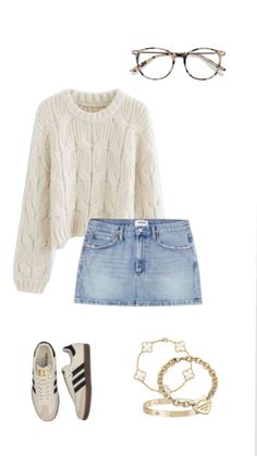 a white sweater, jeans shorts and sneakers