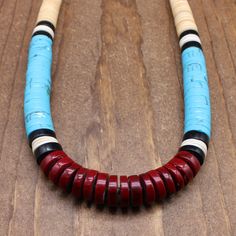 "Kewa (formerly Santo Domingo) tapered heishi necklace. This necklace is 22 1/2\" long. The top two colors are natural shell, clam and melon shell. The turquoise and red stones are block or synthetic. The size of the heishi is 5mm in back to 13mm in front. The necklace has a sterling silver hook clasp. It is in good condition. Thank you for shopping in our store. Please let us know if you have questions.  NECK-1188K-NK-10 k *The color you see on your screen may not reflect the actual stone color due to variations in monitors*" Cheap Blue Heishi Beads Necklaces, Necklaces Ideas, Turquoise Men, Heishi Necklace, Beaded Jewelry Necklaces, Red Stones, Seed Beading, Beaded Earrings Patterns, Tucson Az