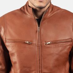 This brown leather biker jacket, with its sleek, polished appearance, is made of premium-quality sheepskin leather. It is designed to lift your overall style game. This timeless vintage biker jacket blends classic biker style with contemporary fashion, ensuring durability and a luxurious feel. This elegant biker-style jacket can easily be worn on casual and semi-formal occasions. This tailored-fit brown leather jacket has a sleek, fitted silhouette with stitched seams. Four external zipper pocke