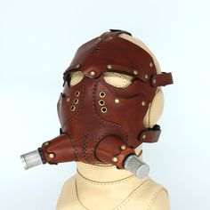 Steampunk Leather Mask, Motorcycle Leather Mask, Biker Mask, Post apocalyptic Mask, Scavenger mask, Halloween costume Mask The mask is made of genuine Italian vegetable tanned leather, hand dyed and sewed. Leather has hydrophobic treatment and it will retain its shape for a very long time. This mask will make a great addition to your costume and will make you look stylish at a themed party. The mask has a cool design. It also has adjustable belts to fit any size. Post Apocalyptic Mask, Apocalyptic Mask, Biker Mask, Mask Halloween Costume, Steampunk Mask, Steampunk Leather, Halloween Costume Mask, Leather Mask, Mask Halloween