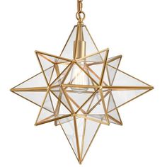 a gold and clear glass star ornament hanging from a chain on a white background